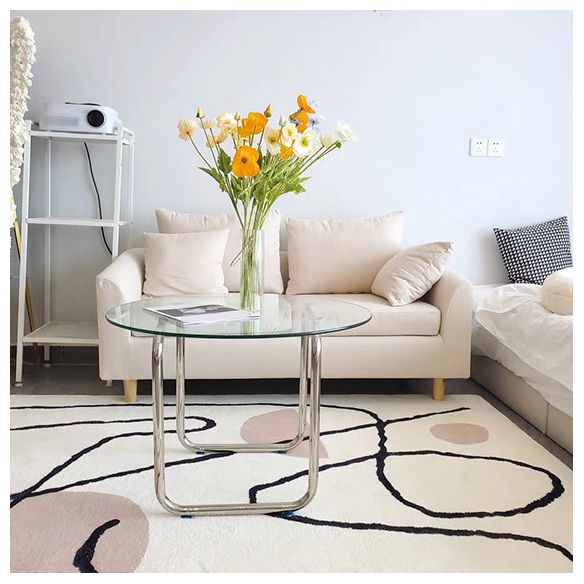 Modern Round Cocktail Table with Glass Top and Steel Sled Base