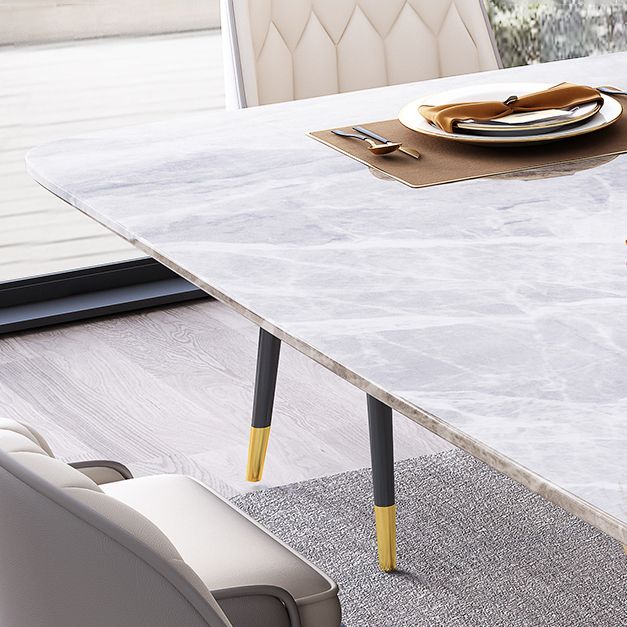 Mesa de comedor de piedra sinterizada de estilo moderno con mesa fija de altura estándar y base de caballete de oro