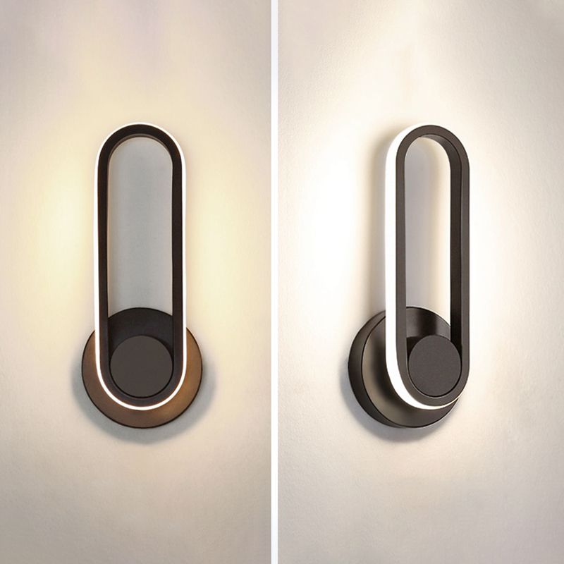 Lacquered Iron Black LED Wall Sconce in Modern Concise Style Silicone Oval Rotatable Wall Lamp