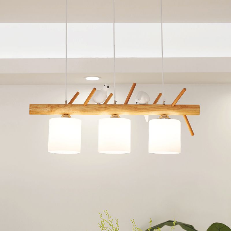 Beige Drum Island Lighting Ideas Simple 2/3 Heads Opaque Glass Pendant Lamp with Bird on Wood Branch Beam Design