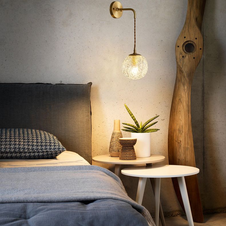 Gold Globe Hanging Wall Sconce in Modern Artistic Style Copper Indoor Wall Lamp with Ripple Crystal Shade