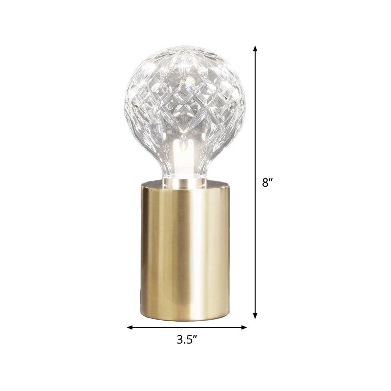 Lámpara de mesa de noche de cristal transparente moderna con luz LED esférica en color dorado con base de metal
