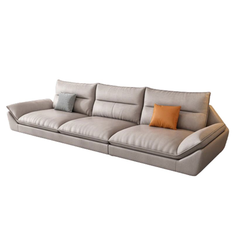 Flared Arm Beige Sectional Sofa with Chaise Pillowed Back Cushions Couch Sectional