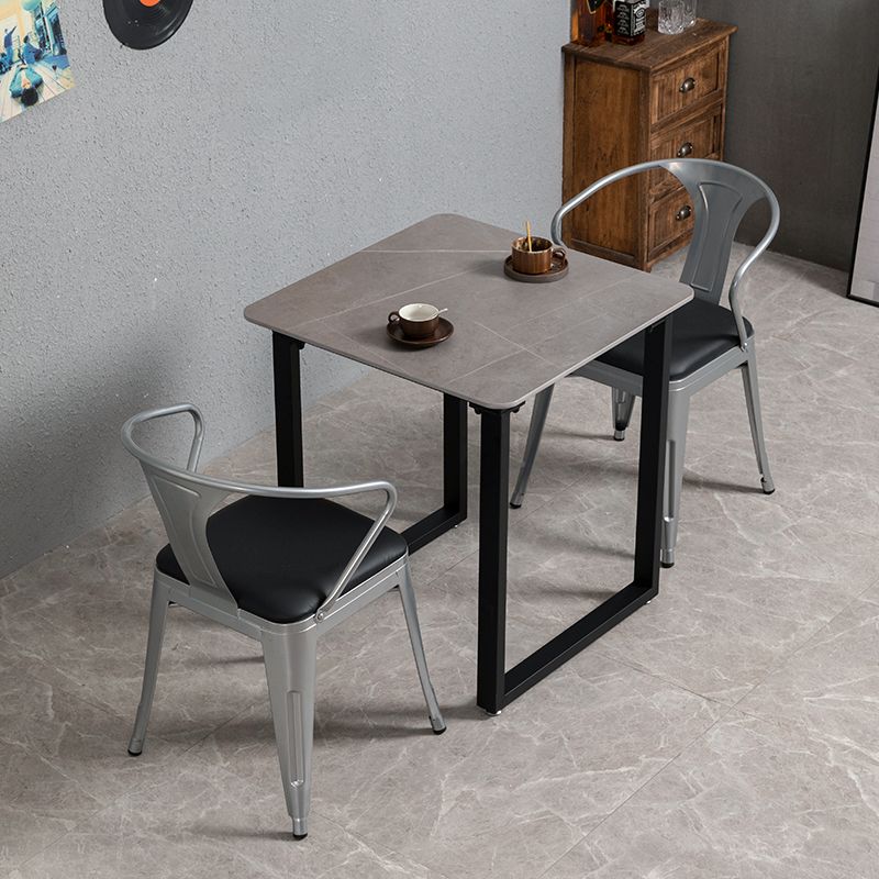 Industrieller Stil grauer gesinterter Stein Esstisch Metallic Basis Rechteck und quadratischer Tisch für Zuhause