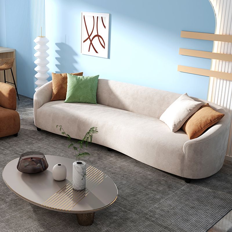 Loveseat curvado de terciopelo moderno con espalda apretada para una sala de bonificación