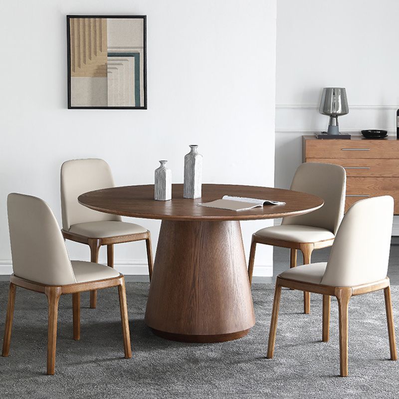 Pedestal Base Is Designed for a Round Coffee Table Made of Walnut Wood