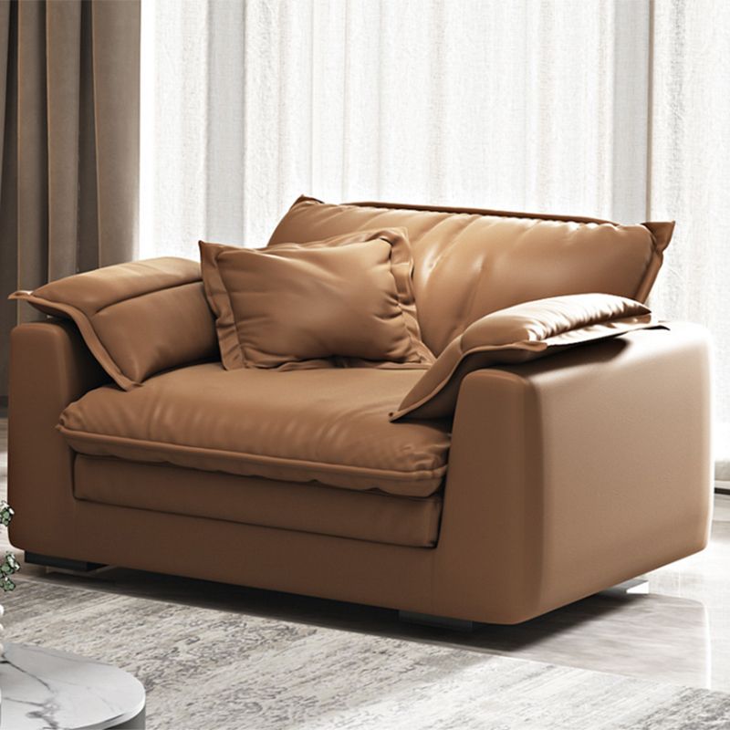 Glam Style Sofa Bed with Sponge Upholstery Filled Orange Faux Leather Sofa