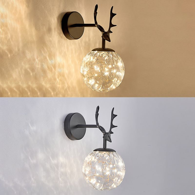 Glass Globe Wall Sconce in Modern Luxury Style Wrought Iron Wall Lamp with Antler Decoration