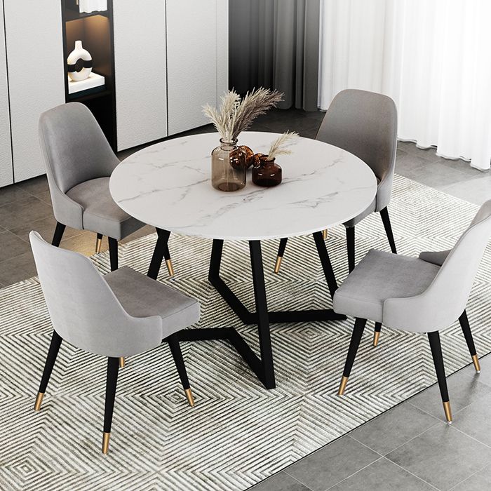 Mesa de comedor de piedra sinterizada Mesa de comedor moderna redonda con marco negro