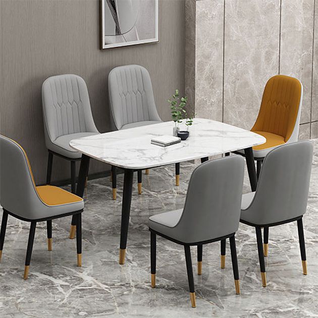 La salle à manger en métal de style glamour préside la chaise en cuir sans bras Parsons pour le restaurant