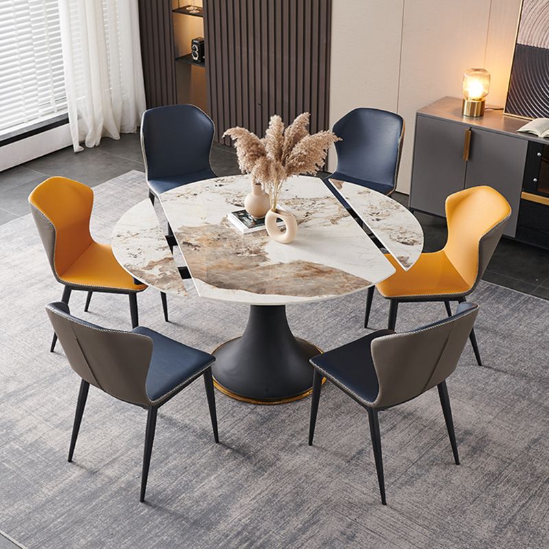 Mesa de comedor de piedra sinterizada de lujo con base de metal negro