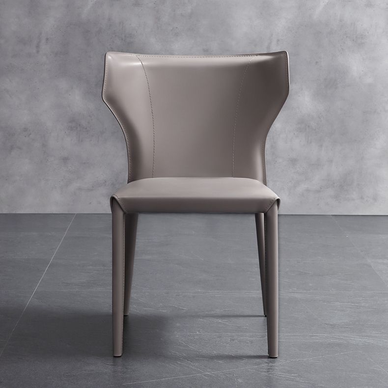 Moderner Wingback Side Stuhl Leder armlosen Essstuhl mit Metallbeinen