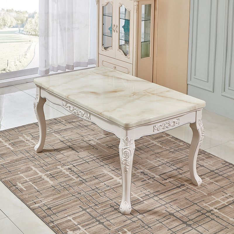 Juego de mesa de mármol victoriano de 5/7 con mesa rectangular de comedor con cávidos con sillas textiles