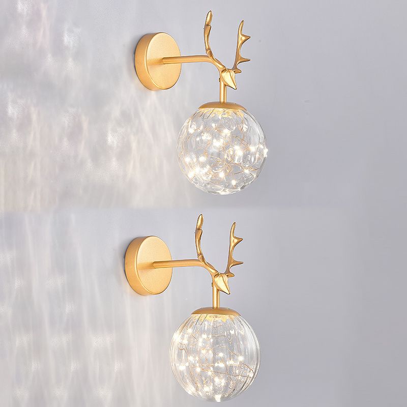 Glass Globe Wall Sconce in Modern Luxury Style Wrought Iron Wall Lamp with Antler Decoration