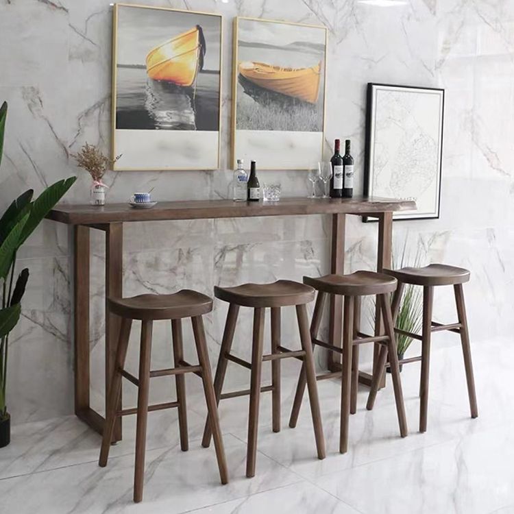 Zeitgenössischer Barhocker aus massivem Holz für den Innenbereich mit Sitz und Fußstütze aus Holz