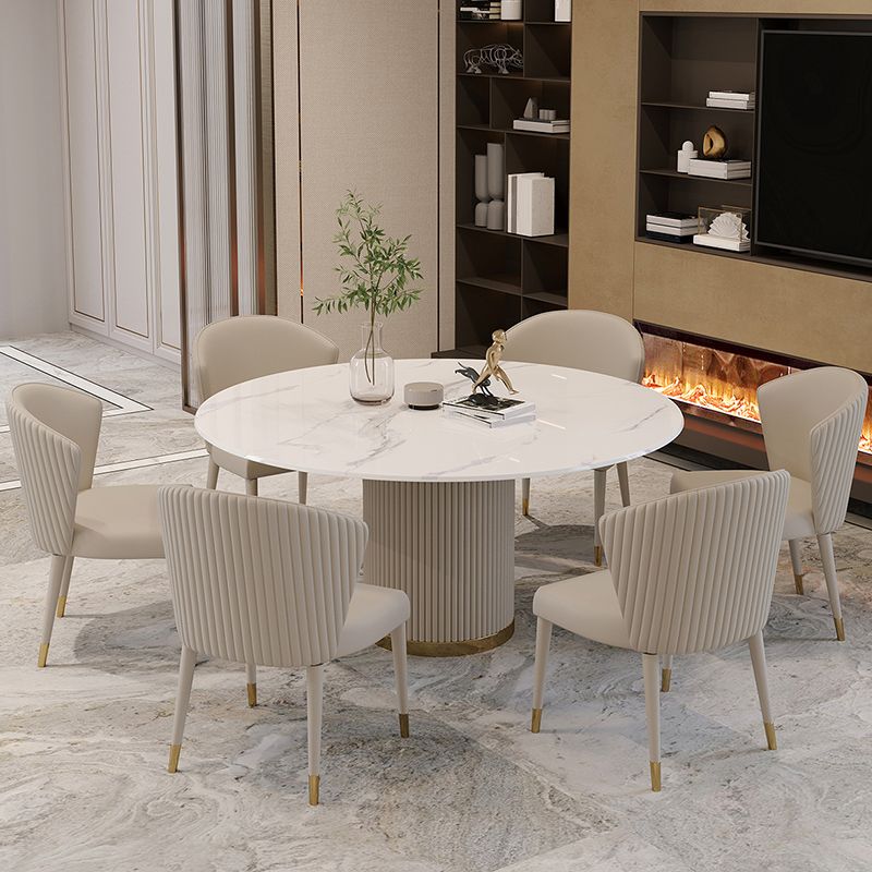 Mesa de comedor de piedra sinterizada mesa redonda de lujo con pedestal de metal en blanco