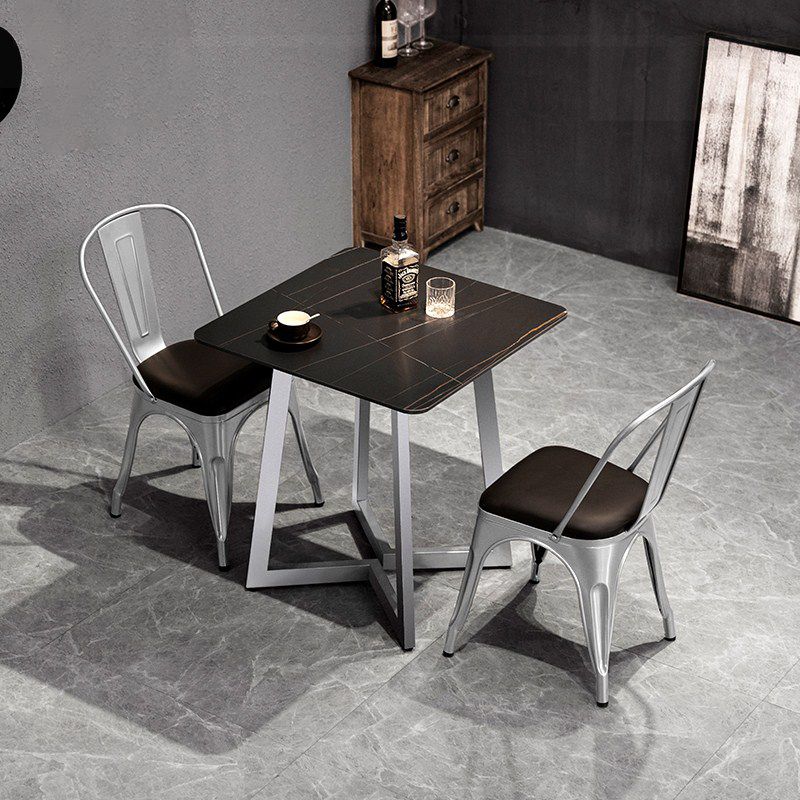 Industriële eettafel Zwart gesinterde stenen eettafel met dubbel voetstuk