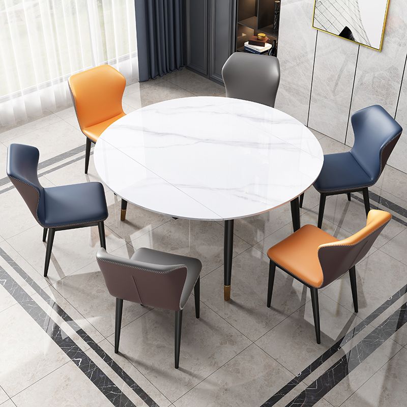 Mesa de comedor tradicional redonda de piedra sinterizada con 4 patas negras