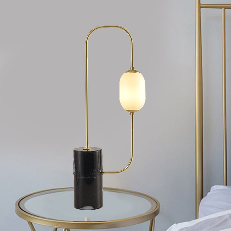 Designador de lámpara de mesita de noche de circuito iluminación de mesa negra y dorada de vidrio mate con base de mármol de cilindro