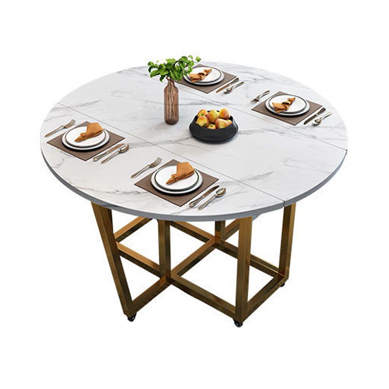 Table à manger de style moderne Table à manger à abattant en pierre frittée avec cadre doré