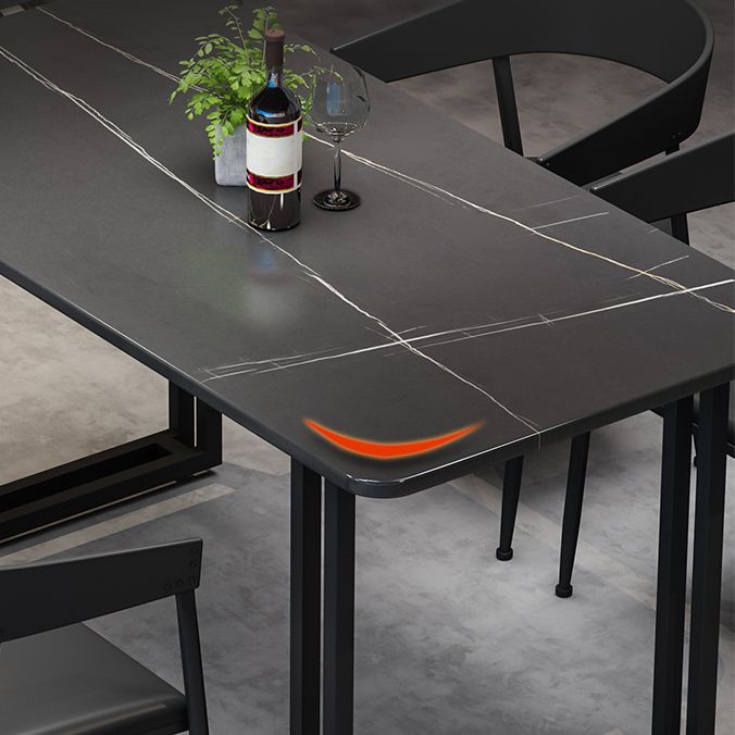 Mesa de comedor de estilo industrial Mesa de comedor de piedra sinterizada negra con base de metal