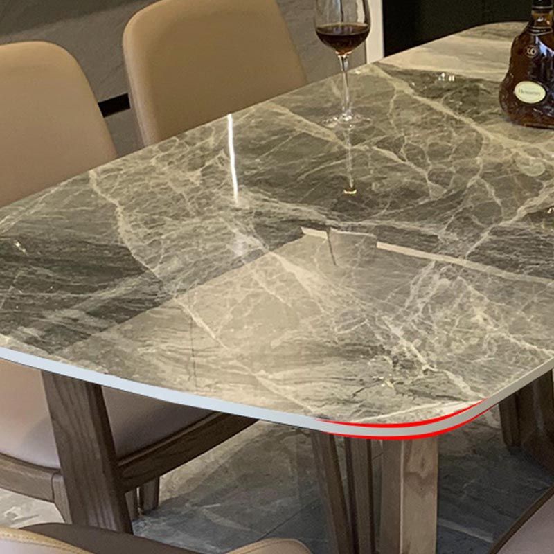 Mesa de comedor de piedra gris con mesa de comedor contemporánea con base de trineo