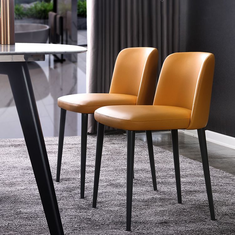 Sillas de comedor de cuero de estilo minimalista Sillas laterales sin brazos con respaldo sólido (juego de 2)
