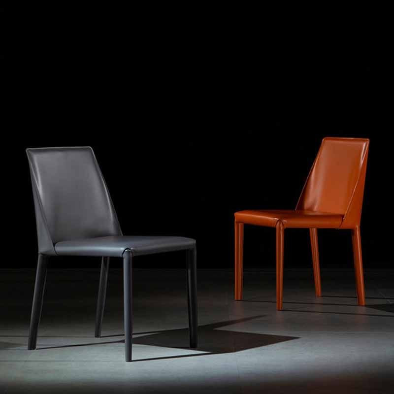Silla de comedor de cuero de silla de montar con respaldo sólido de restaurante estilo diseñador
