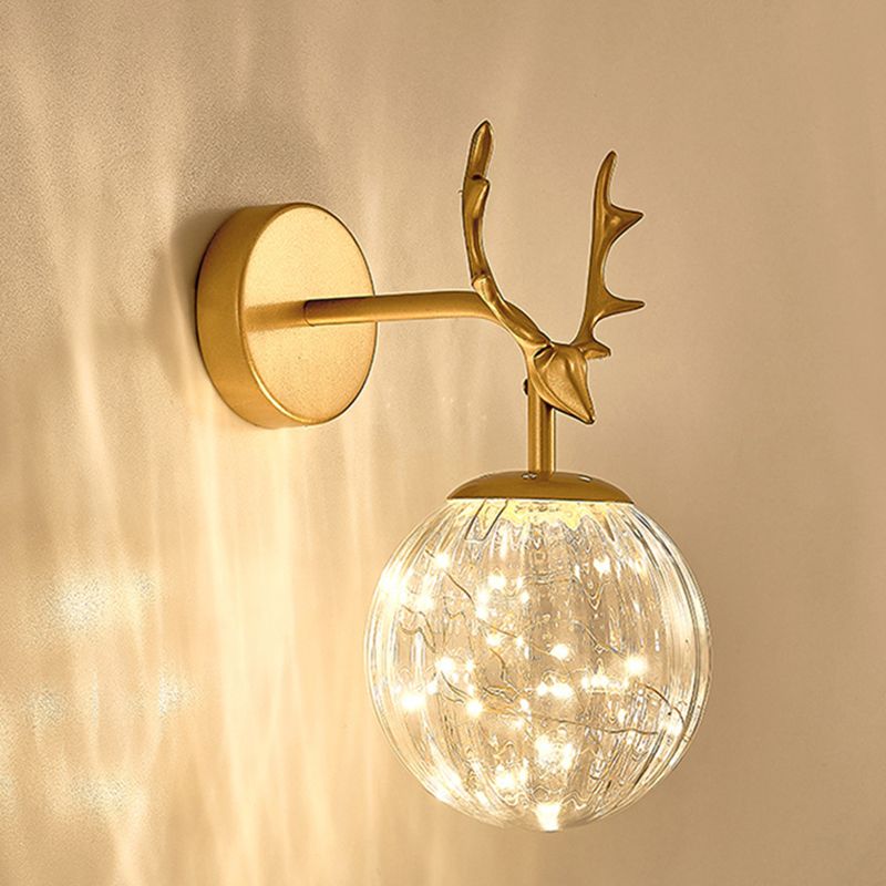 Glass Globe Wall Sconce in Modern Luxury Style Wrought Iron Wall Lamp with Antler Decoration