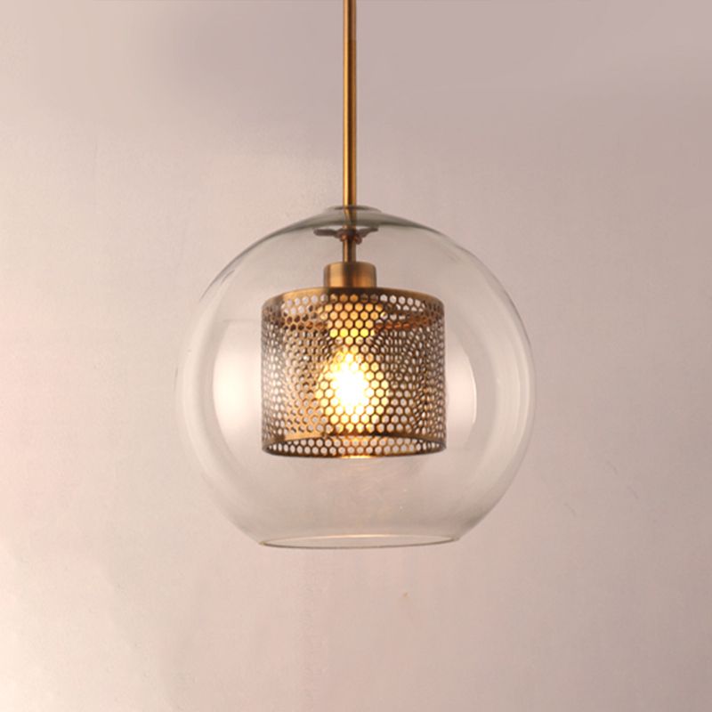 Éclairage de pendentif rond unique contemporain avec une teinte en verre transparent