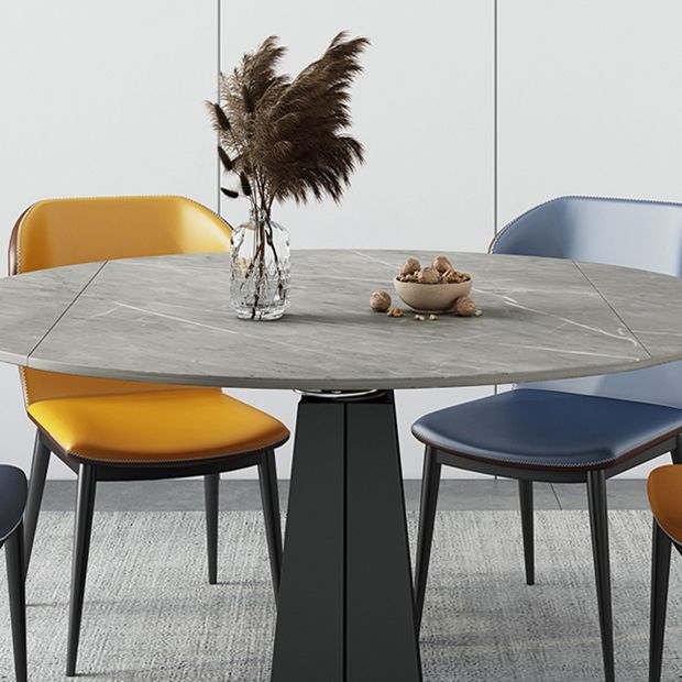 Mesa de comedor redonda extensible Mesa de piedra sinterizada moderna con pedestal negro