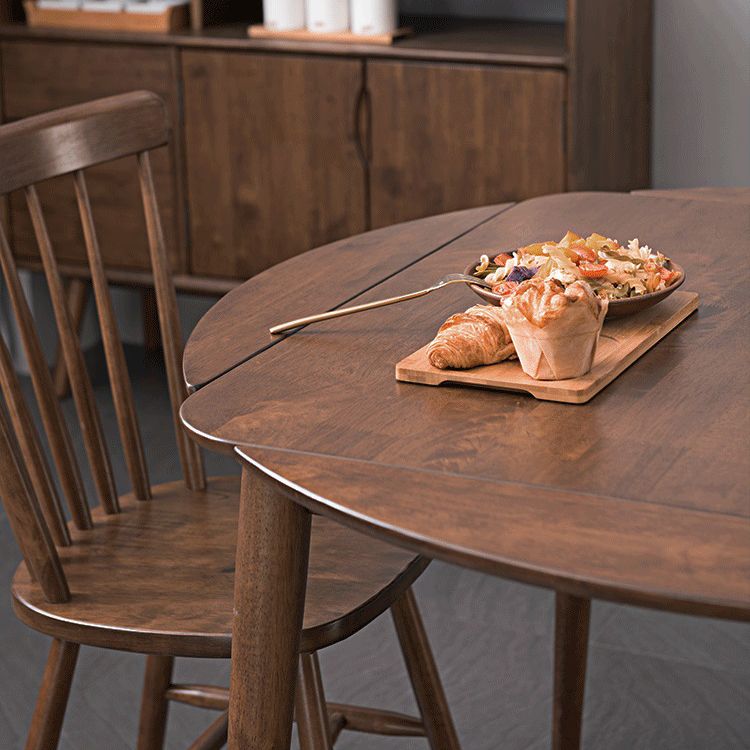 Uitbreidbare ronde eettafel in bruine moderne verstelbare rubberen houten tafel met 4 poten