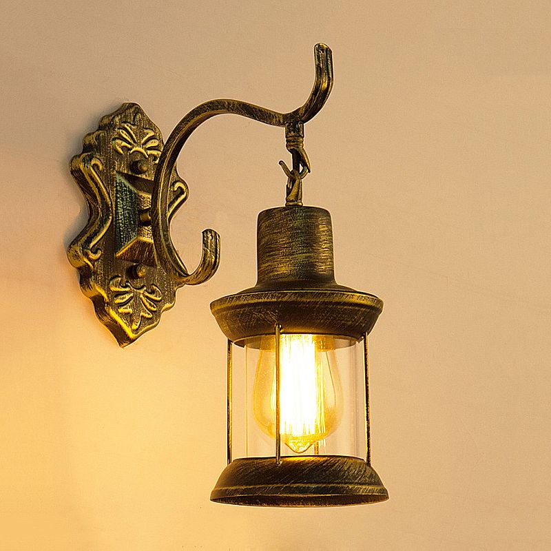 1 Bulb Kerosene Wall Mounted Light Fixture Rustic Style Aged Bronze Clear Glass Lighting with Carved Pattern