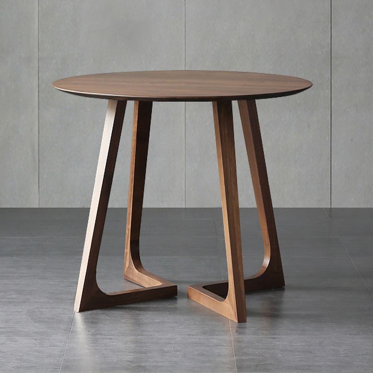 Mesa redonda de ashwood brown sencilicidad de doble pedestal para comedor