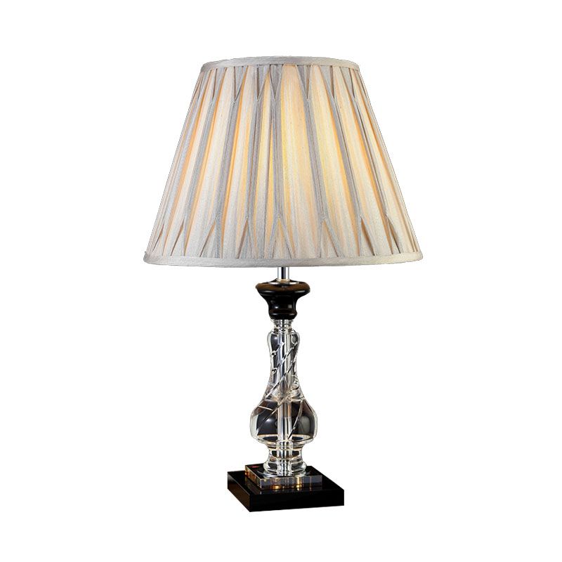 Lámpara de mesita de noche Minimalism Bell, 1 luz nocturna de tela ligera en gris crema con base de cristal translúcido