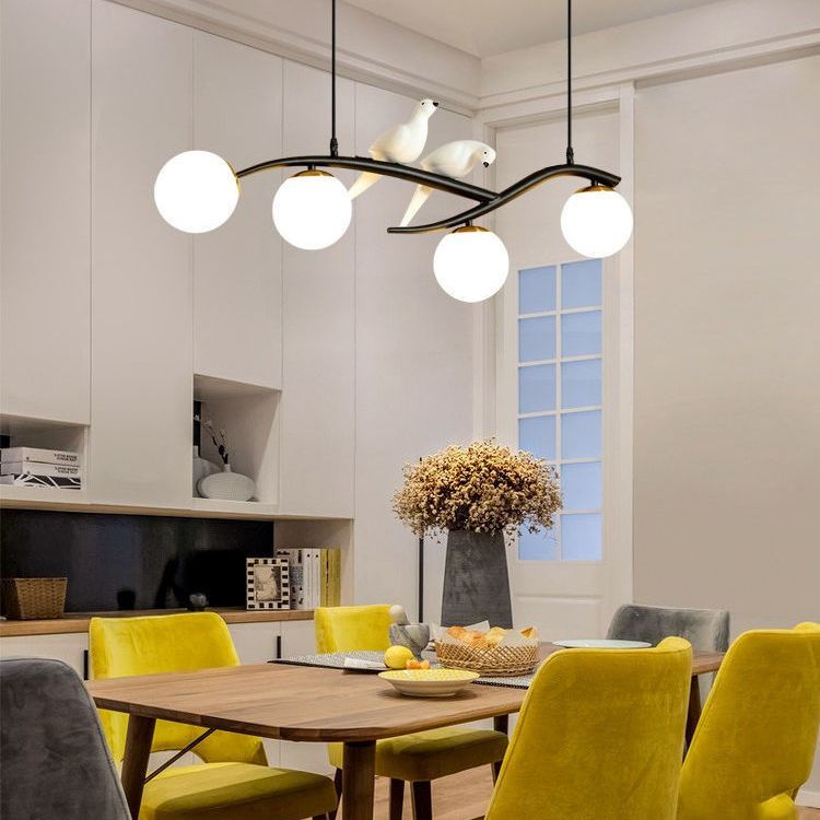 Glass Globe Island Light in Modern Singularity Wrought Iron Pendant Light with Resin Bird Decoration