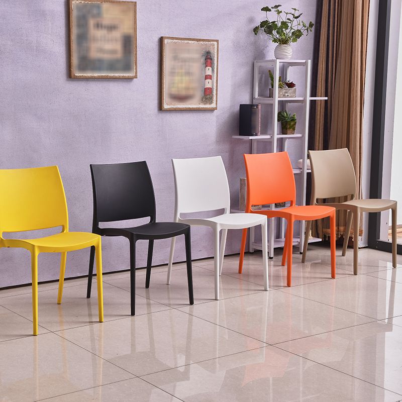 Silla lateral de comedor escandinava sin brazos con respaldo abierto Sillas laterales de comedor de plástico