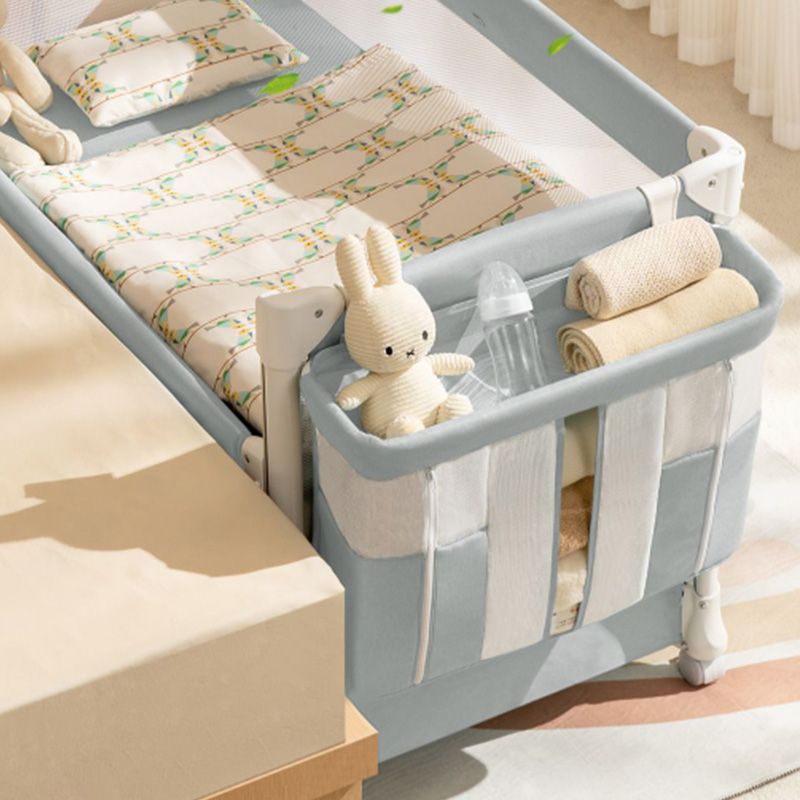Contemporary Color Matching Nursery Bed Plastic Wheels Baby Crib