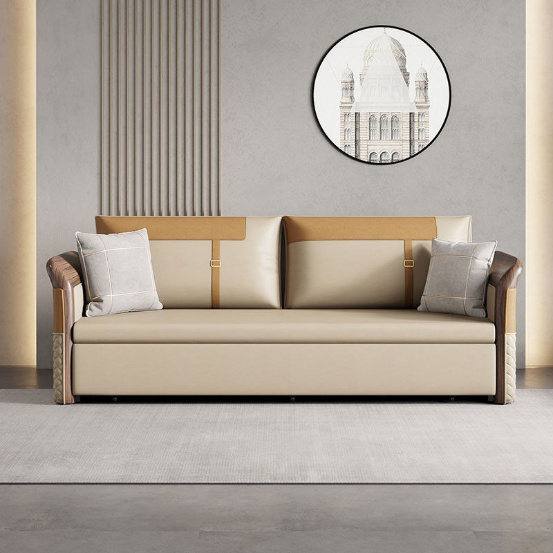 Contemporary Bonded Leather Sleeper Sofa with Pillow Back and Flared Arms