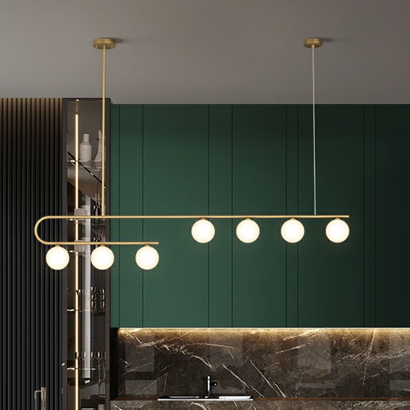 Linear Restaurant Island Pendant Light Ivory Ball Glass Postmodern LED Hanging Lamp in Gold
