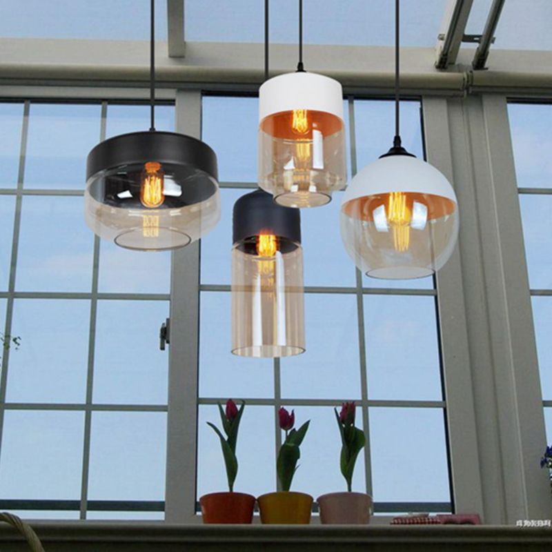 Lumière suspendue géométrique à 1 lumière dans le pendentif en fer forgé industriel de style vintage avec une teinte en verre