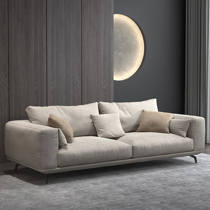 Contemporary Faux Leather Pillows Back Sofa with Tuxedo Arm in Beige