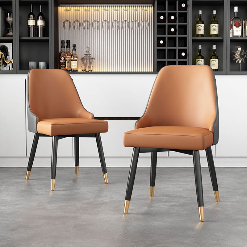 Sillas sin brazos de comedor de metal Glam, sillas Parsons de comedor de cuero PU para restaurante