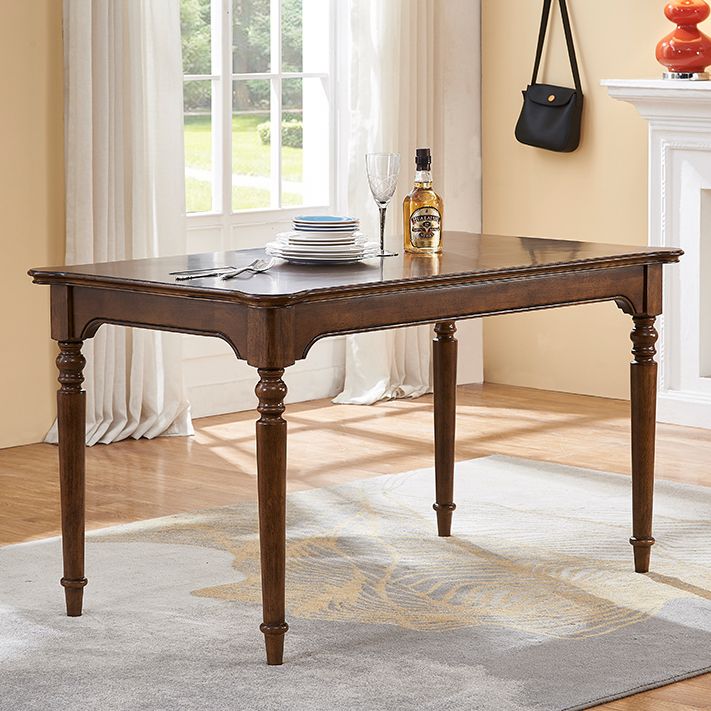 Mesa de comedor medieval moderna rectangular de madera de caucho en color marrón con 4 patas