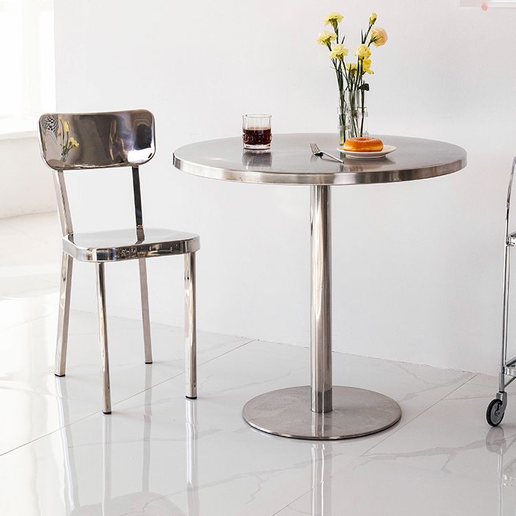 Mesa de comedor con astillas de metal Mesa de comedor de acero inoxidable con base de pedestal