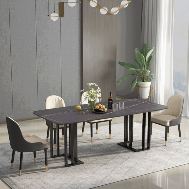 Set di sala da pranzo nera moderna di pietra sinterizzata con tavolo rettangolo e set da pranzo a base di metallo