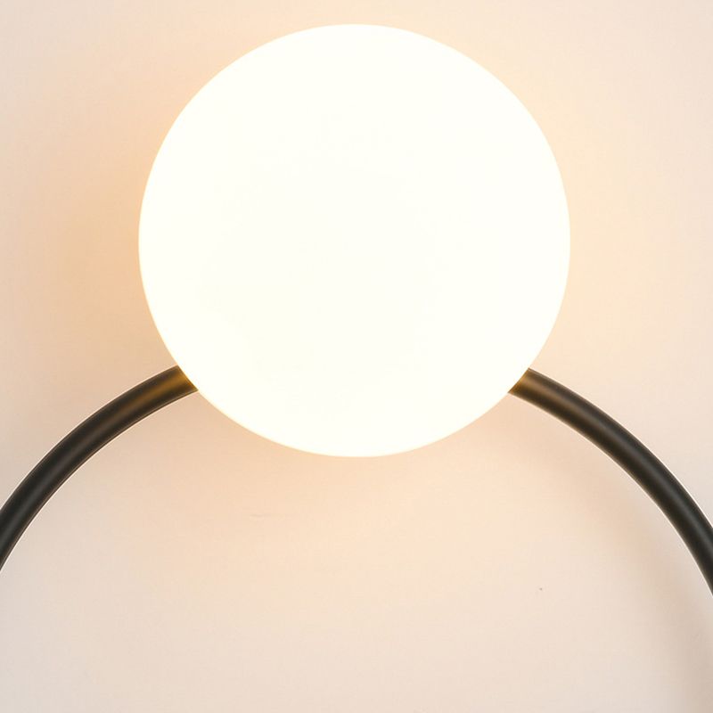 Luz de pared de noche después del minimalismo moderno de una cabeza iluminación de montaje de pared negro