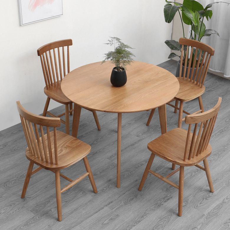 Mesa de comedor redonda contemporánea mesa de madera maciza con 4 patas para el comedor