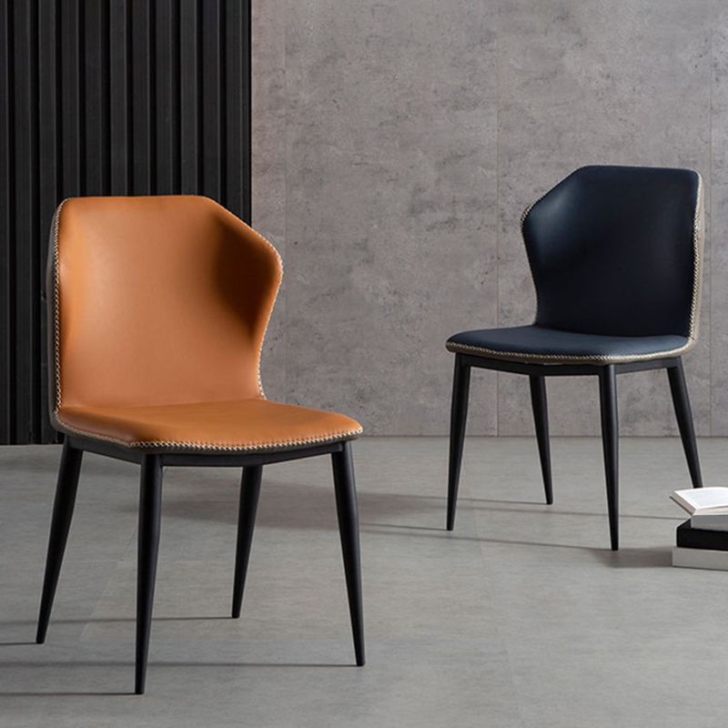 Silla moderna del comedor del metal Silla sin brazos Wingback para el restaurante