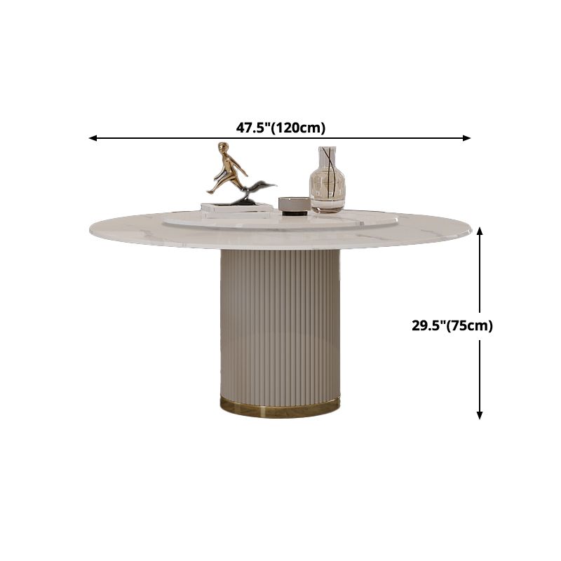 Mesa de comedor de piedra sinterizada mesa redonda de lujo con pedestal de metal en blanco